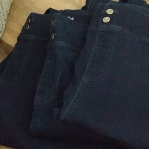 Three pairs of dark denim leggings. Plus size 2xl.